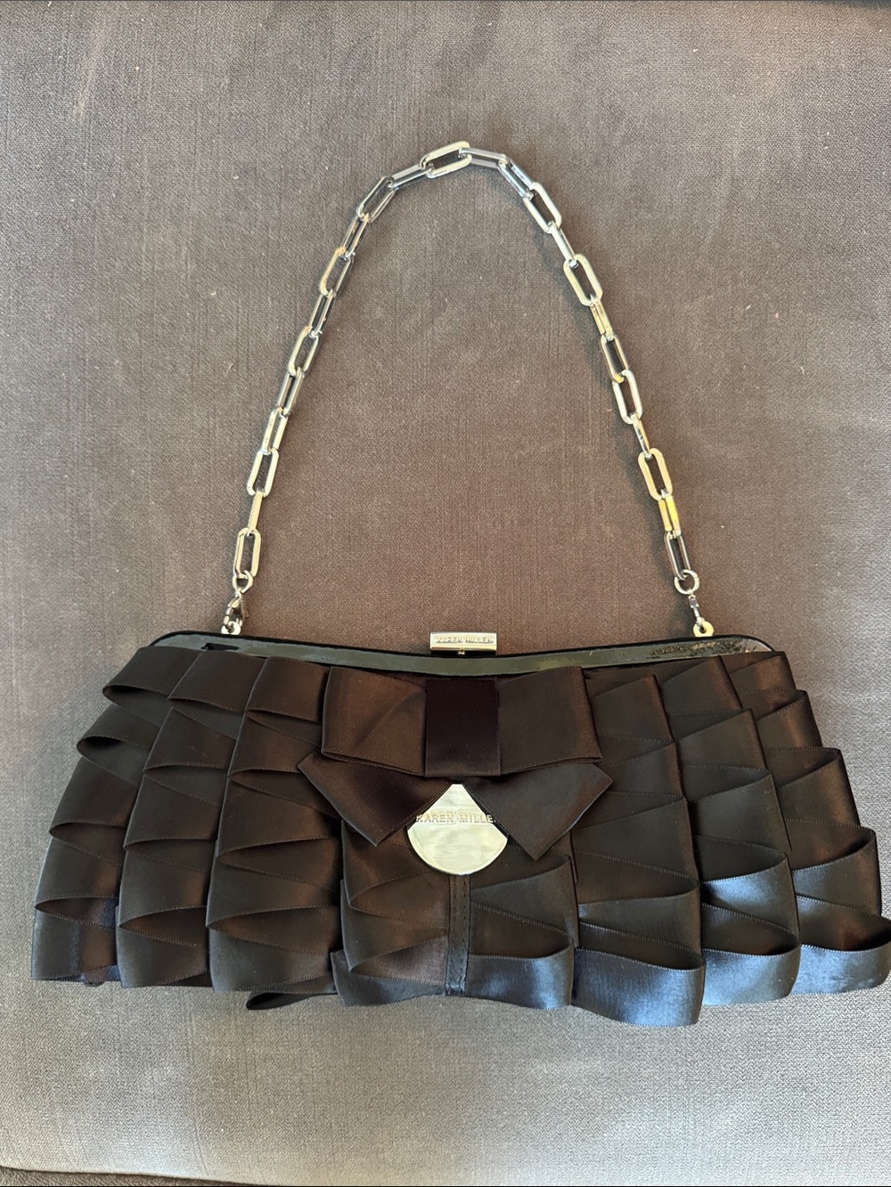 Karen Millen Black Satin Ruffle Clutch with Bow Accent and Silver Chain
